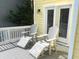 Deck with two adirondack chairs and footrests at 2 Pelican Reach # Share 10, Isle of Palms, SC 29451