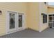Exterior view of the house showing a door to access the deck at 2 Pelican Reach # Share 10, Isle of Palms, SC 29451