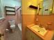 Cozy pink bathroom featuring a bathtub, sink, and ceramic tile floor at 1229 Central Ave, Summerville, SC 29483