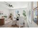 Open dining area connects to living room, featuring natural light and decor that enhances comfort and style at 223 Abercom Place Dr, Moncks Corner, SC 29461