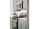 Close-up of modern stainless steel oven, range, and cabinets, showcasing clean lines and functionality at 223 Abercom Place Dr, Moncks Corner, SC 29461