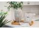 Stylish countertop decor featuring a vase with greenery, decorative accents, and natural light at 427 Grove End Rd, Moncks Corner, SC 29461