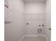 Clean laundry room featuring tile floors, and laundry hookups at 741 Blue Iris Way, Summerville, SC 29486