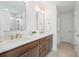 Bathroom with double sink and a door leading to the toilet and shower at 178 Cantona Dr, Summerville, SC 29483