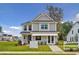 Charming two-story home with gray siding, manicured lawn, and inviting entrance under a sunny blue sky at 178 Cantona Dr, Summerville, SC 29483