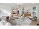 Inviting living room showcasing stylish furnishings, natural light, and a seamless flow to other living spaces at 178 Cantona Dr, Summerville, SC 29483