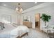Spacious main bedroom features a tray ceiling, walk-in closet, and an en-suite bathroom, creating a private retreat at 178 Cantona Dr, Summerville, SC 29483