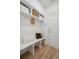 Organized mudroom with built-in bench, hooks, and shelving, offering practical storage and convenience at 178 Cantona Dr, Summerville, SC 29483