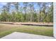 Large backyard with lush greenery and privacy, perfect for outdoor activities and relaxation at 361 Wappoo Trace Ln, Summerville, SC 29486