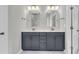 Elegant bathroom with a double vanity, modern fixtures, and plenty of storage space at 361 Wappoo Trace Ln, Summerville, SC 29486