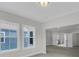 Bedroom with a view to the ensuite bath, natural light and neutral colors for relaxation at 361 Wappoo Trace Ln, Summerville, SC 29486