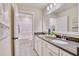 Bathroom featuring dual sinks, gray quartz countertops, and decorative tile flooring at 163 Seaton Street, Summerville, SC 29486