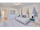 bedroom with decorative tree-themed wall art, carpet, and matching side tables at 163 Seaton Street, Summerville, SC 29486