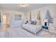 Charming bedroom features a cute teepee bedframe and a forest-themed accent wall at 163 Seaton Street, Summerville, SC 29486