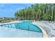 Large community pool with lounge chairs offering a relaxing outdoor experience at 163 Seaton Street, Summerville, SC 29486