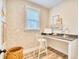 Bright office space features stylish wallpaper, a gray countertop desk, and decorative artwork at 163 Seaton Street, Summerville, SC 29486