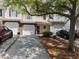 Charming townhomes feature private garages, brick accents, and beautifully maintained landscaping at 258 Kelsey Blvd, Wando, SC 29492