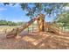 Wooden playground structure with a large slide for  at 106 O'Leary Cir, Summerville, SC 29483