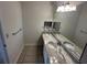 Bathroom with granite countertop, dual mirrors, and tile flooring at 1600 Long Grove Dr # 628, Mount Pleasant, SC 29464
