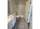 Bright bathroom features a shower-tub combination and a single sink with a granite countertop at 1600 Long Grove Dr # 628, Mount Pleasant, SC 29464