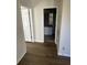 Hallway featuring access to bathroom, tile floor, and neutral paint at 1600 Long Grove Dr # 628, Mount Pleasant, SC 29464