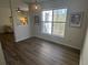 Cozy living room with large window providing ample natural light at 1600 Long Grove Dr # 628, Mount Pleasant, SC 29464