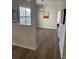 Living room with open layout, large window, and modern lighting at 1600 Long Grove Dr # 628, Mount Pleasant, SC 29464
