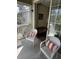 Cozy screened patio area with comfortable chairs, perfect for enjoying the outdoors at 1600 Long Grove Dr # 628, Mount Pleasant, SC 29464