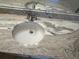 Close up of a stylish single sink vanity featuring a neutral granite countertop at 1600 Long Grove Dr # 628, Mount Pleasant, SC 29464