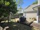 Backyard deck provides space for a BBQ and outdoor seating in this home's backyard at 2851 Curran Pl, Mount Pleasant, SC 29466