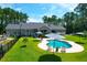 Home with pool and expansive backyard, overlooking a lake at 769 Bulls Bay Blvd, Awendaw, SC 29429