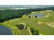 Aerial view of a golf course with water features at 769 Bulls Bay Blvd, Awendaw, SC 29429