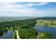 Aerial view of waterfront property and golf course at 769 Bulls Bay Blvd, Awendaw, SC 29429