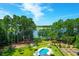 Home with pool and garden backing up to a lake at 769 Bulls Bay Blvd, Awendaw, SC 29429
