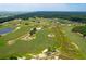Aerial view of golf course community with houses and lakes at 769 Bulls Bay Blvd, Awendaw, SC 29429