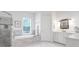 Elegant bathroom featuring a soaking tub, walk-in shower, and marble finishes at 769 Bulls Bay Blvd, Awendaw, SC 29429