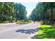 Gated entrance to a community with lush trees at 769 Bulls Bay Blvd, Awendaw, SC 29429