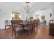 Spacious dining room with hardwood floors and chandelier at 769 Bulls Bay Blvd, Awendaw, SC 29429