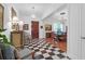 Bright entryway, checkerboard floor, views to dining room at 769 Bulls Bay Blvd, Awendaw, SC 29429