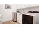 Laundry room with white cabinets, washer, and dryer at 769 Bulls Bay Blvd, Awendaw, SC 29429