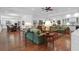 Open living room with hardwood floors and views into the kitchen at 769 Bulls Bay Blvd, Awendaw, SC 29429