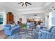 Living room with hardwood floors, comfortable seating, and blue accents at 769 Bulls Bay Blvd, Awendaw, SC 29429
