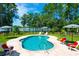 Kidney-shaped pool with patio and lake view at 769 Bulls Bay Blvd, Awendaw, SC 29429