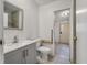 Well lit bathroom with tiled floors and modern fixtures plus handicap support at 2991 Blackfish Rd, Johns Island, SC 29455