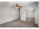 Bedroom with ceiling fan, plush carpet and sliding mirror closet doors at 2991 Blackfish Rd, Johns Island, SC 29455