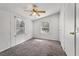 Bright bedroom featuring 2 windows and a ceiling fan, natural light at 2991 Blackfish Rd, Johns Island, SC 29455