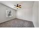 Clean bedroom features a window offering natural light and a ceiling fan at 2991 Blackfish Rd, Johns Island, SC 29455