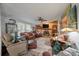 Inviting living room with fireplace, wood accents, and comfortable furniture at 2991 Blackfish Rd, Johns Island, SC 29455