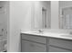 Bathroom featuring double sink vanity, white countertops, and neutral-toned cabinets at 2172 Macallan Blvd, Ravenel, SC 29470