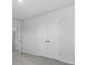 Empty bedroom featuring double door closet and entry and plush gray carpeting at 2172 Macallan Blvd, Ravenel, SC 29470